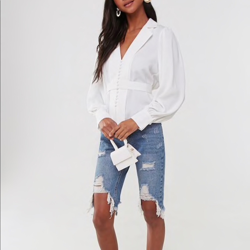 woven top featuring a V-neckline